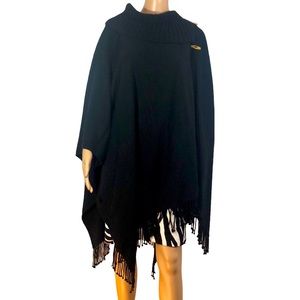 Pantropic poncho o/s black with barrel button embellishment sweater material.